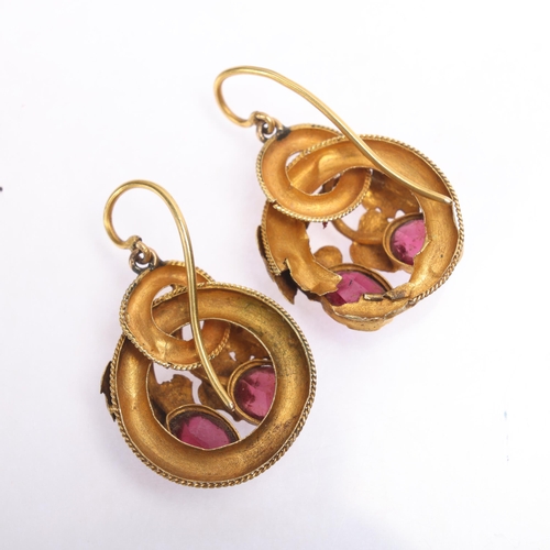 1194 - A pair of Antique Victorian garnet drop earrings, circa 1860, the chased floral motif set with oval ... 