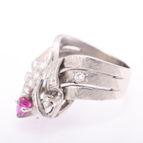 1198 - A 14ct white gold ruby and diamond cocktail ring, set with oval mixed-cut ruby, modern round brillia... 