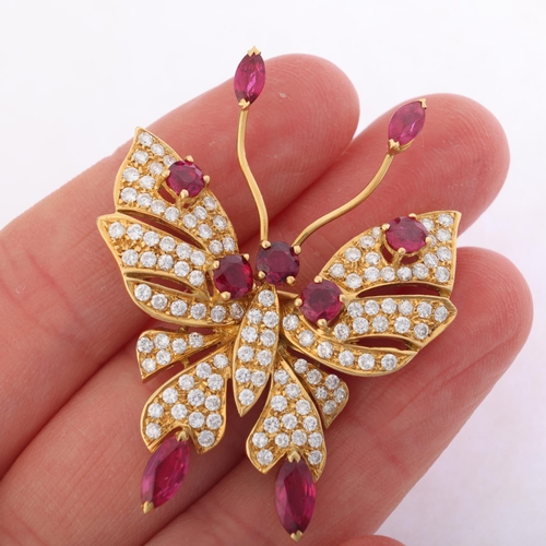 1199 - An 18ct gold ruby and diamond butterfly brooch, the head, wing tips and antennae set with round and ... 