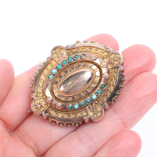 1203 - An Antique Victorian Etruscan Revival 9ct rose gold turquoise bombe mourning brooch, circa 1880, ova... 