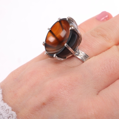 1213 - A Vintage 9ct white gold banded agate cup ring, maker CW, London 1979, set with round polished conca... 