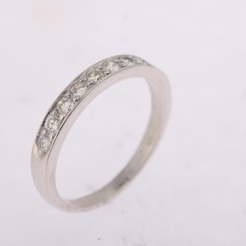 1214 - An 18ct white gold diamond half eternity ring, indistinct maker, London 1995, pave set with modern r... 