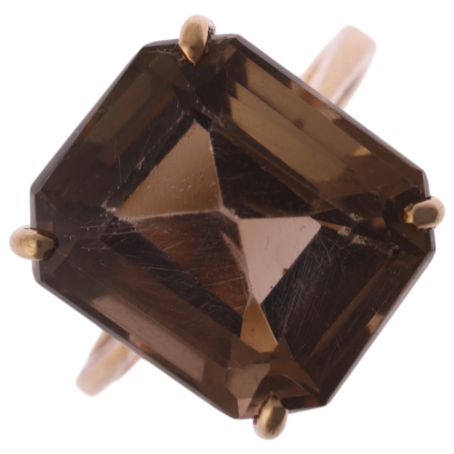 1215 - A 9ct gold smoky quartz dress ring, indistinct maker, Birmingham 1998, claw set with octagonal step-... 