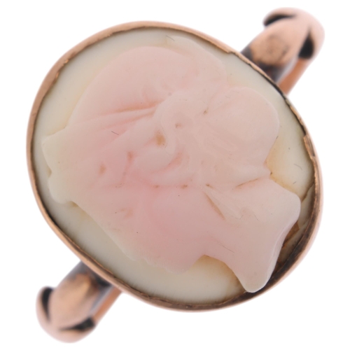 1216 - A 9ct rose gold pink conch shell cameo ring, relief carved depicting female profile, setting height ... 