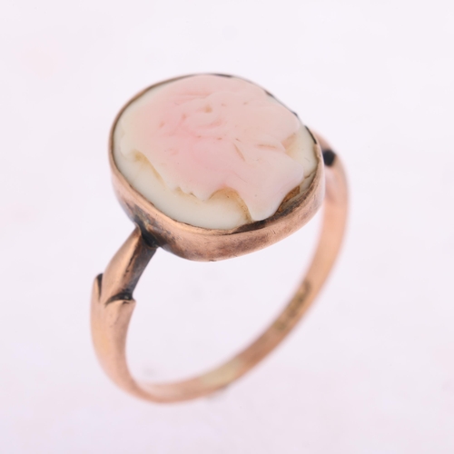 1216 - A 9ct rose gold pink conch shell cameo ring, relief carved depicting female profile, setting height ... 