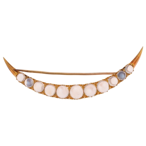 1221 - An Antique Victorian 18ct gold moonstone crescent brooch, circa 1890, claw set with row of graduated... 