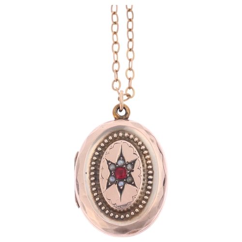 1224 - An Antique Victorian pink paste and split pearl locket pendant necklace, on 9ct gold belcher link ch... 