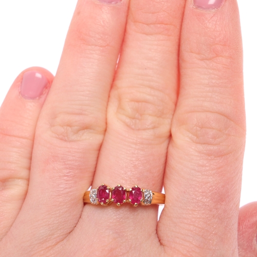 1225 - An 18ct gold ruby and diamond dress ring, claw set with oval mixed-cut rubies and single-cut diamond... 