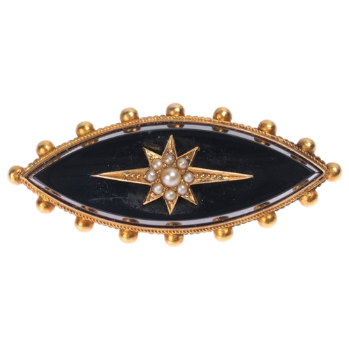 1233 - An Antique Victorian 15ct gold onyx and split pearl mourning brooch, marquise form with polished ony... 