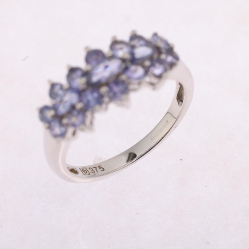 1242 - A 9ct white gold tanzanite cluster ring, set with marquise and round-cut tanzanites, setting height ... 