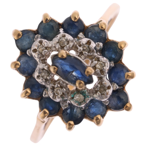 1243 - A 9ct gold sapphire and diamond marquise cluster ring, import London 1990, setting height 15.2mm, si... 