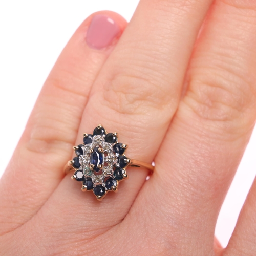 1243 - A 9ct gold sapphire and diamond marquise cluster ring, import London 1990, setting height 15.2mm, si... 