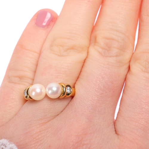 1245 - GARRARD - an 18ct gold pearl and diamond torque ring, maker G&Co, import London 1993, set with 5.9mm... 