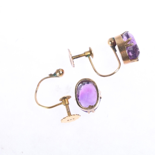 1246 - A pair of 9ct gold amethyst earrings, claw set with oval mixed-cut amethysts, and screw-back fitting... 