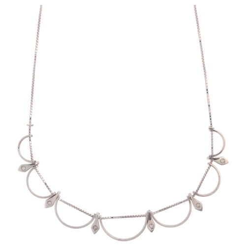 1253 - An 18ct white gold diamond fringe necklace, set with modern round brilliant-cut diamonds on 18ct int... 