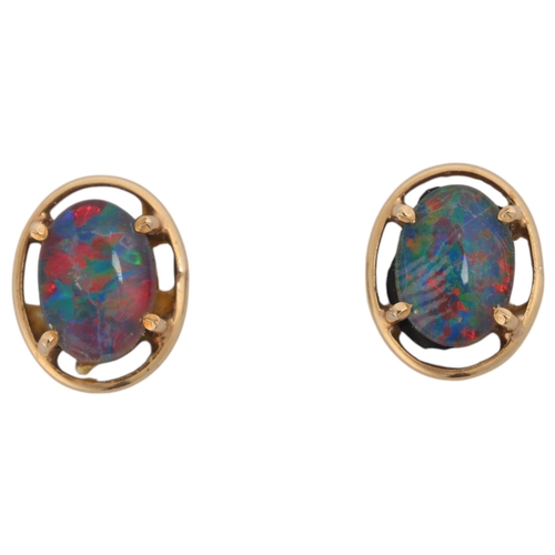 1256 - A pair of 14ct gold black opal triplet stud earrings, unmarked mount tests as 14ct, 9.6mm, 1.6g