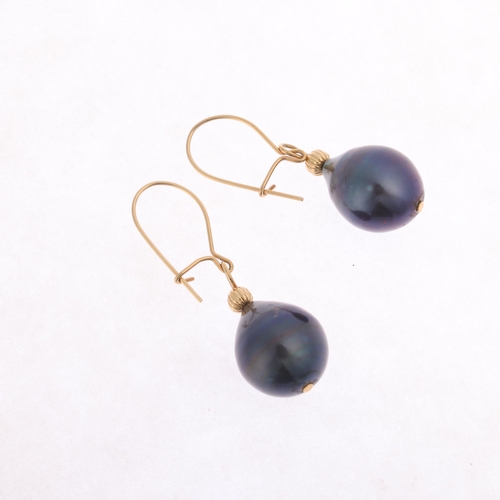 1261 - A pair of 9ct gold black pearl drop earrings, with kidney fittings, 29.9mm, 3.2g