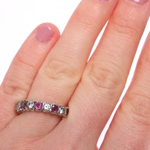 1262 - A 9ct gold ruby and cubic zirconia half eternity ring, setting height 4.3mm, size L, 3g