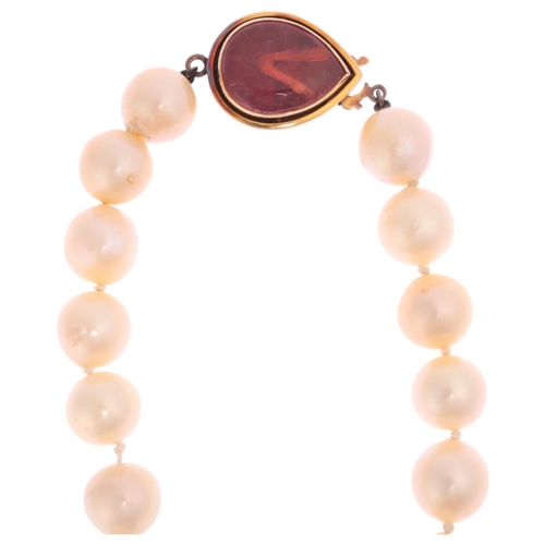 1268 - A long single-strand pearl bead necklace, set with 9.4mm pearls, and 14ct gold pink tourmaline pear ... 