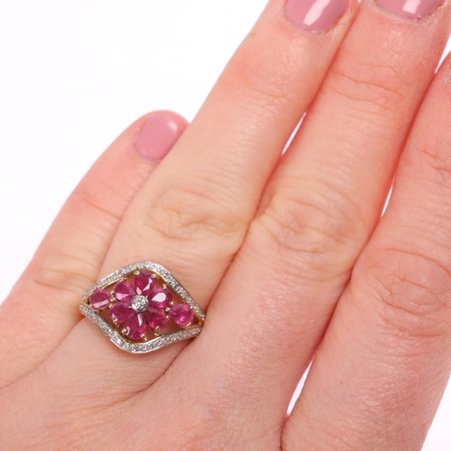 1274 - A 9ct gold ruby and diamond flowerhead dress ring, set with pear-cut rubies and single-cut diamonds,... 