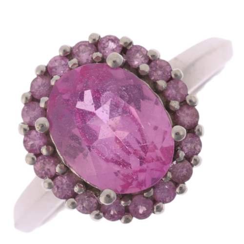 1276 - A 9ct white gold pink sapphire cluster ring, set with oval and round-cut pink sapphires, setting hei... 