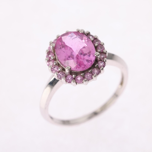 1276 - A 9ct white gold pink sapphire cluster ring, set with oval and round-cut pink sapphires, setting hei... 