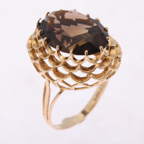 1286 - A Vintage 9ct gold smoky quartz dress ring, maker FM, London 1973, set with oval mixed-cut smoky qua... 