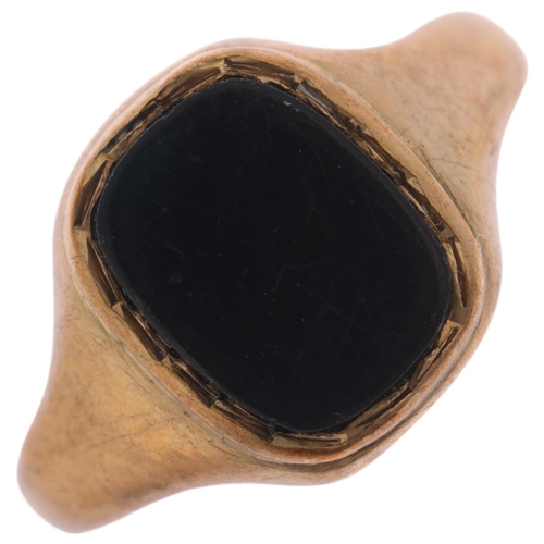 1303 - A 9ct gold onyx signet ring, maker HVS, setting height 11.1mm, size K, 1.8g