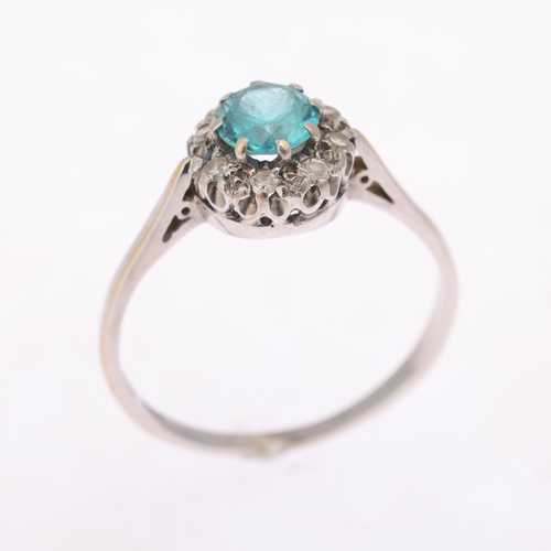 1304 - An 18ct white gold blue zircon and diamond cluster ring, maker MBG, London 1960, setting height 9.1m... 