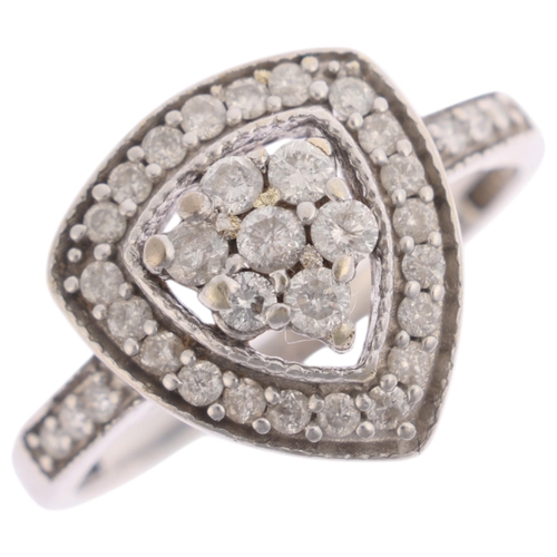 1319 - A 9ct white gold diamond triangular cluster ring, pave set with modern round brilliant-cut diamonds,... 