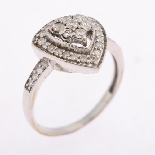 1319 - A 9ct white gold diamond triangular cluster ring, pave set with modern round brilliant-cut diamonds,... 