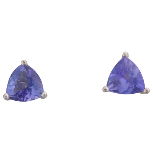 1322 - A pair of 18ct white gold single stone tanzanite stud earrings, claw set with trillion-cut tanzanite... 