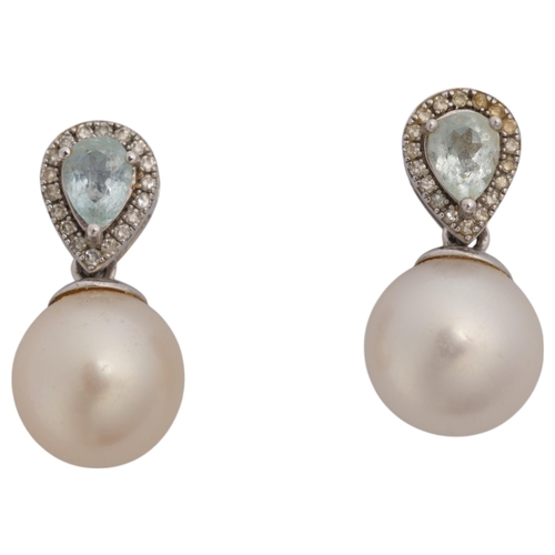 1325 - A pair of 9ct white gold pearl aquamarine and diamond drop stud earrings, set with 7.8mm pearls susp... 