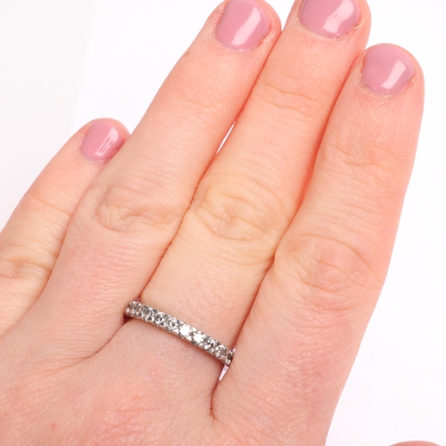 1330 - A platinum diamond half eternity ring, set with modern round brilliant-cut diamonds, total diamond c... 