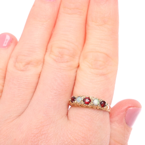 1333 - A 9ct gold five stone garnet and opal half hoop ring, maker J&J, London 1992, setting height 5mm, si... 