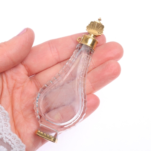 1384 - An 18th century French Louis XV gold-mounted crystal glass pear-shaped slimline scent bottle, circa ... 