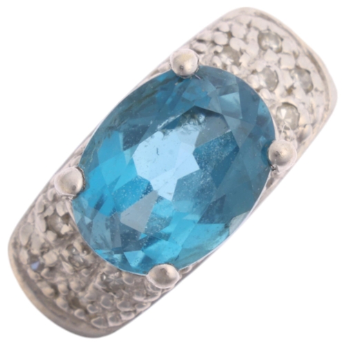 1387 - A 9ct white gold blue topaz and diamond dress ring, claw-set with oval mixed cut topax and diamond s... 