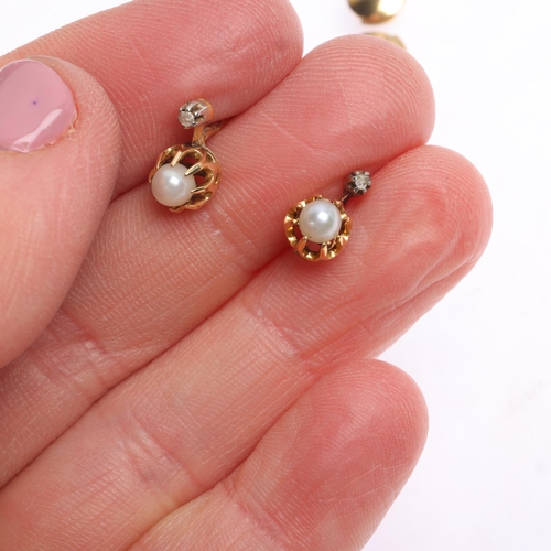 1391 - A pair of French 18ct gold pearl and diamond stud earrings, each basket set with 3.9mm pearl and ros... 