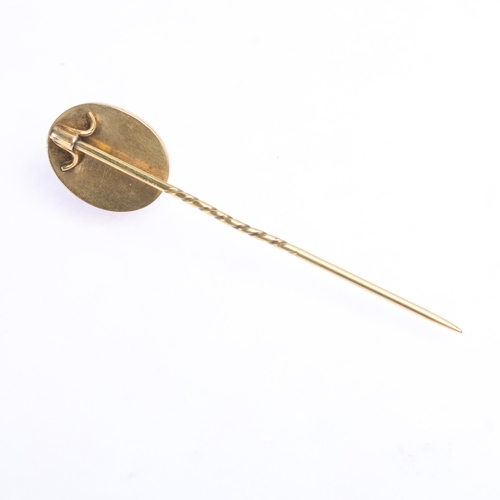 1394 - An Antique Victorian Etruscan revival 18ct gold carbuncle garnet and split pearl stickpin, the oval ... 