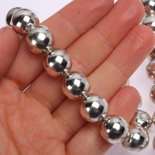 1406 - A sterling silver ball chain necklace and bracelet set, 47cm and 22cm, 103.3g total (2)