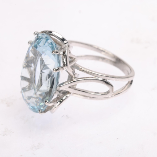 1419 - A silver blue synthetic spinel dress ring, setting height 18.2mm, size L, 5.9g