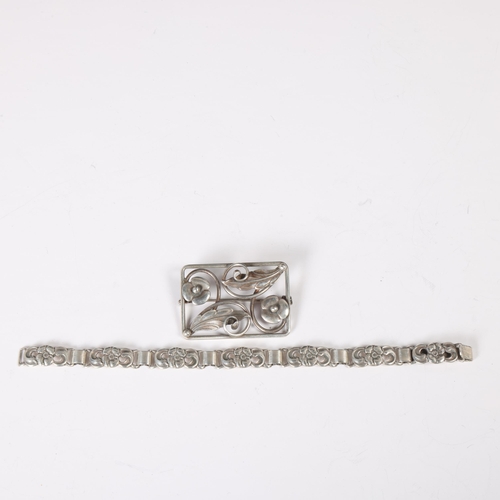 1496 - JOS KAHN - an Art Nouveau Danish silver floral bracelet and brooch set, bracelet 19cm, brooch 47.1mm... 