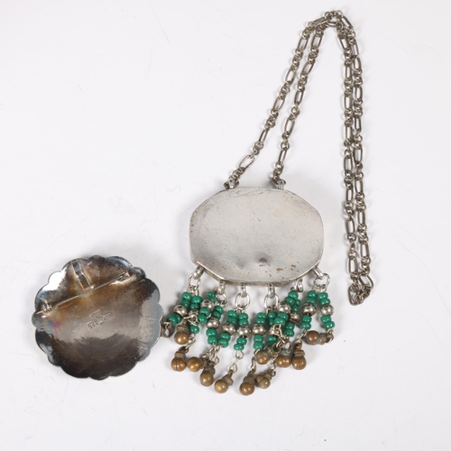 1516 - A Mexican sterling silver amulet pendant necklace, and a Peruvian silver and 18ct gold brooch, 51.1m... 