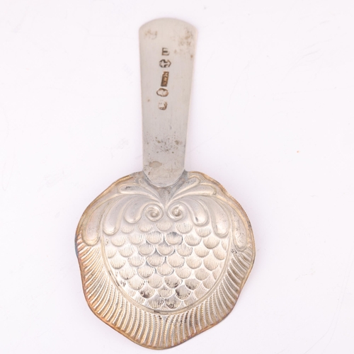 1555 - A George III silver 'Strawberry' tea caddy spoon, Wardell & Kempson, Birmingham 1818, plain handle w... 