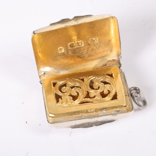 1571 - A Victorian silver vinaigrette, George Unite, Birmingham 1864, rectangular form with bright-cut engr... 