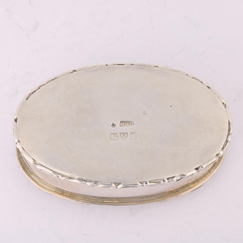 1573 - An Edwardian silver box, Cohen & Charles, Chester 1906, oval form with inset Jasperware plaque and r... 