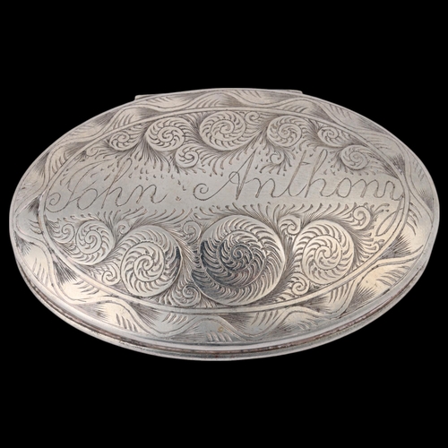 1575 - **WITHDRAWN**An Antique 18th century silver plated snuffbox, oval form with engraved spiral and star... 