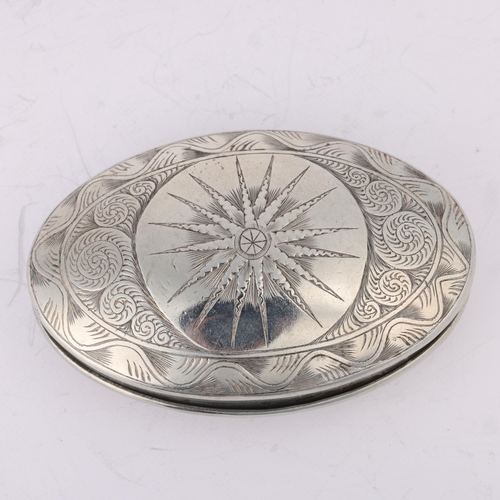 1575 - **WITHDRAWN**An Antique 18th century silver plated snuffbox, oval form with engraved spiral and star... 