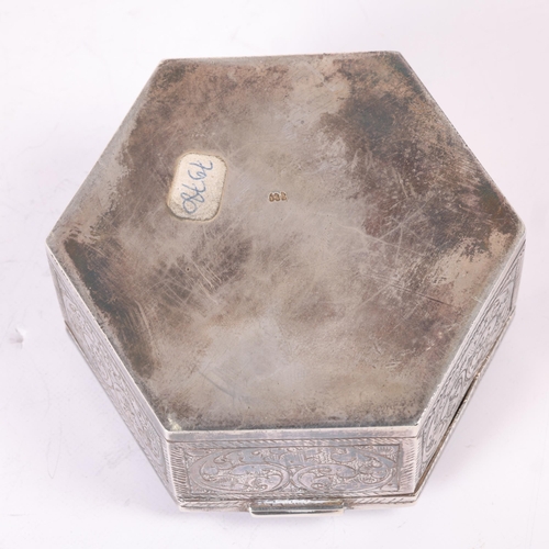 1579 - An Indian 800 silver box, hexagonal form with allover relief embossed foliate decoration, 7.5cm, 4.2... 