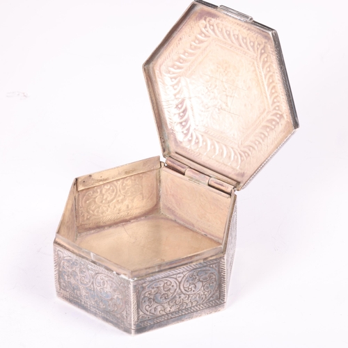 1579 - An Indian 800 silver box, hexagonal form with allover relief embossed foliate decoration, 7.5cm, 4.2... 